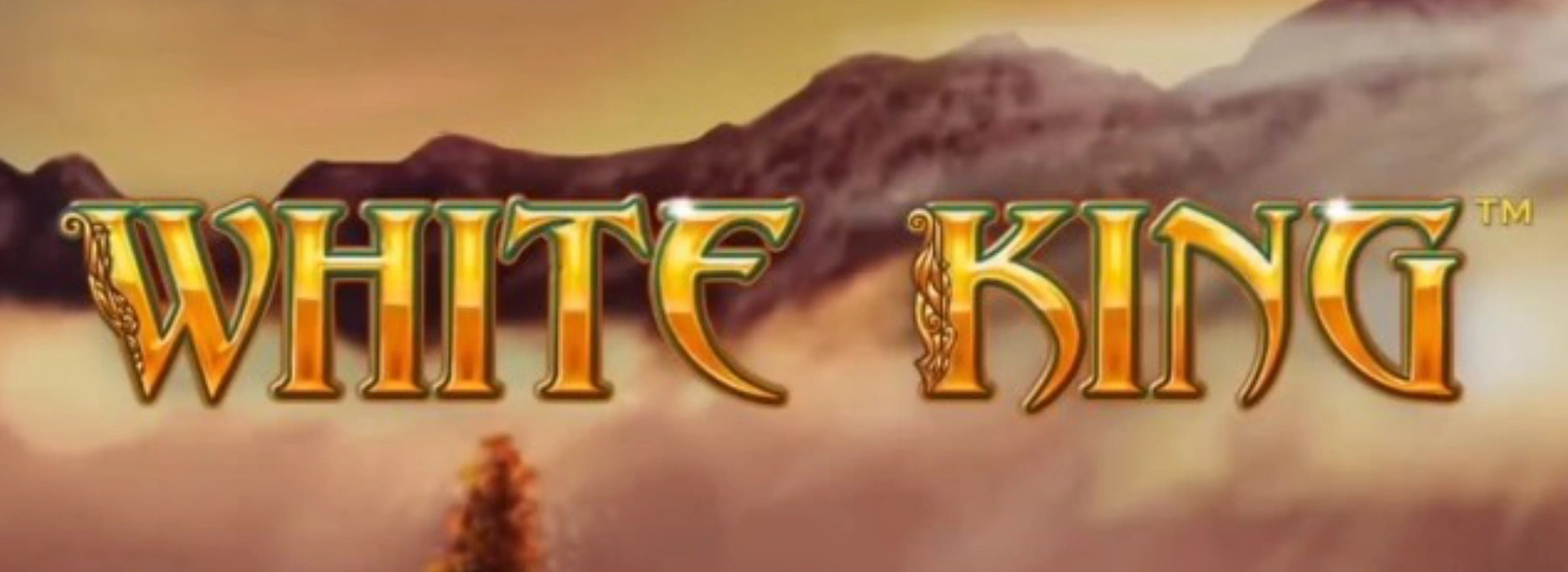 The text "WHITE KING" in gold letters against a background of a misty mountain landscape.